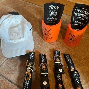 2 leashes with collars. 4 Drink holders  and 1 Nike Hat.